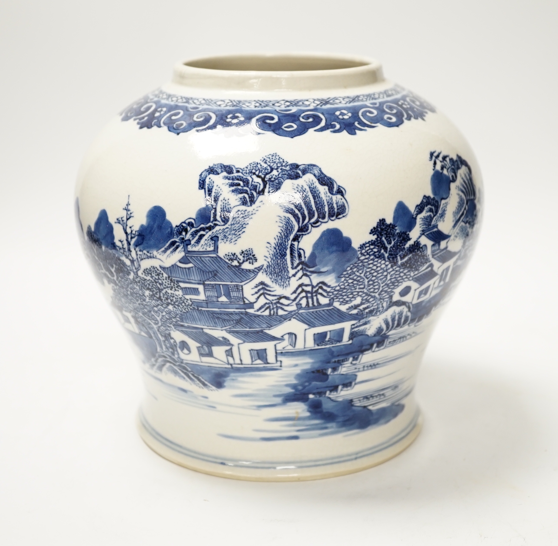 A Chinese Qianlong blue and white ‘soft paste’ porcelain landscape jar, 19cm high